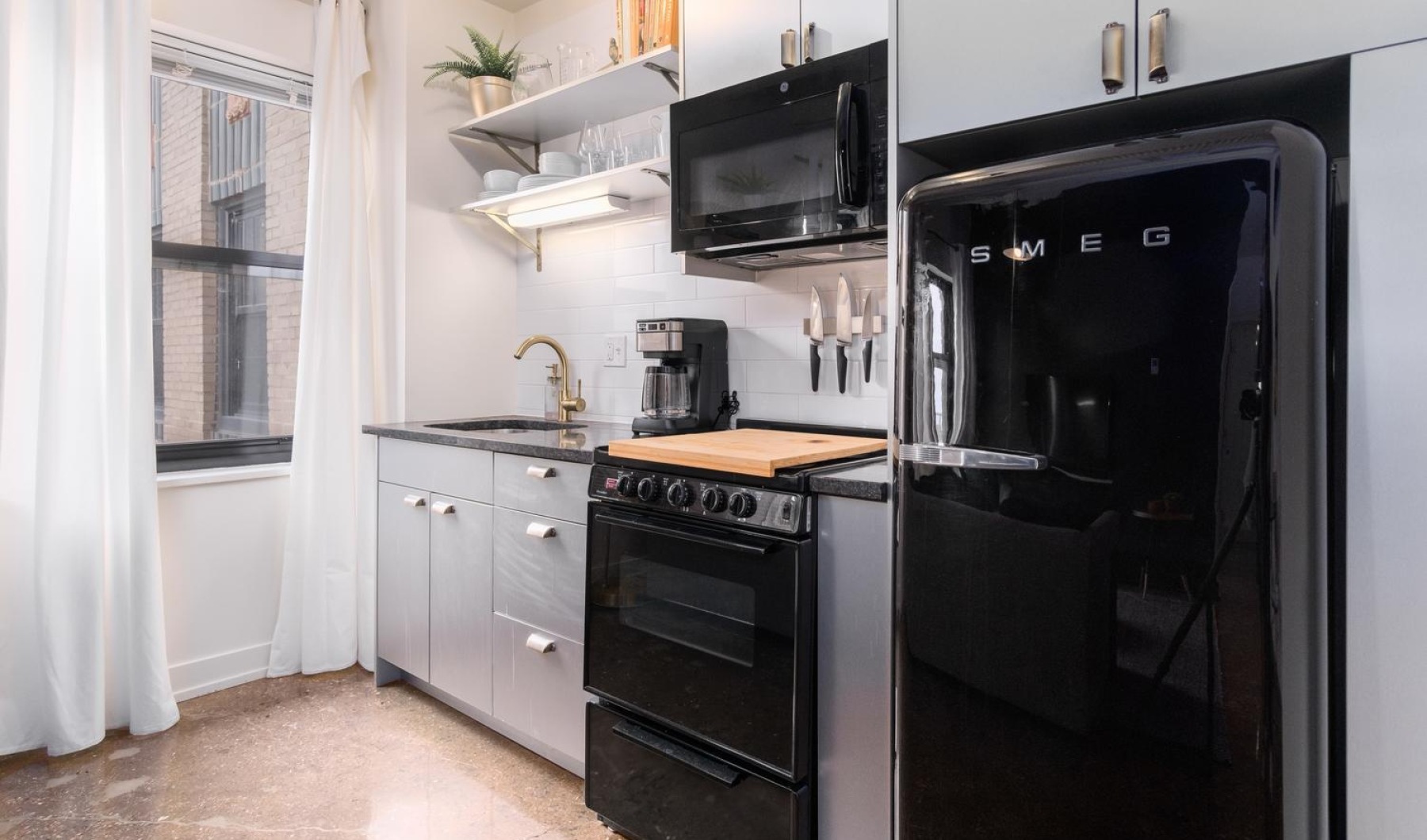 Kitchen with black appliances