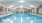 brightly lit indoor swimming pool