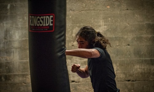 boxing exercise classes heavy bag full-body workout beginner-friendly