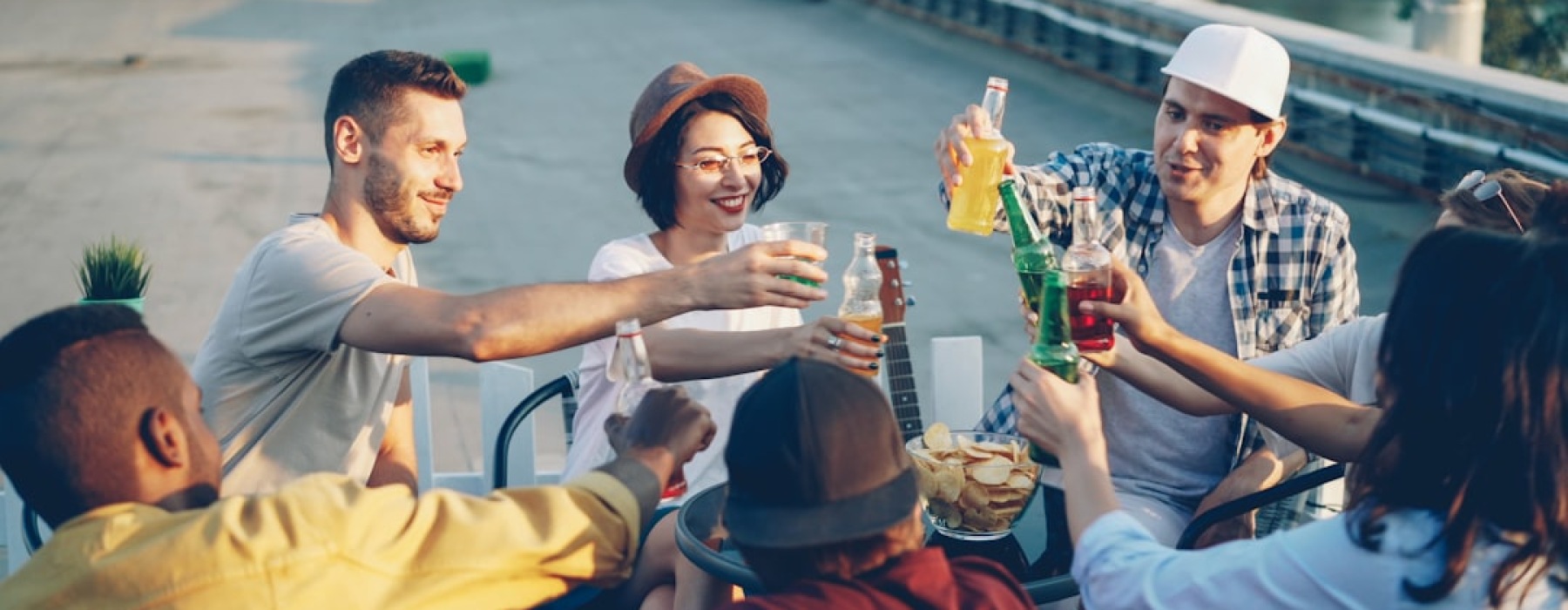patrons enjoying drinks on a high-rise terrace