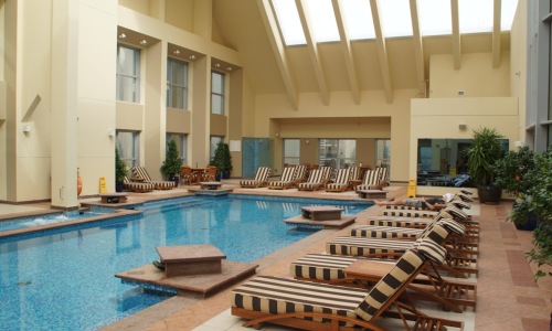 luxury indoor swimming pool in modern Chicago apartment building - Chicago apartment indoor pool